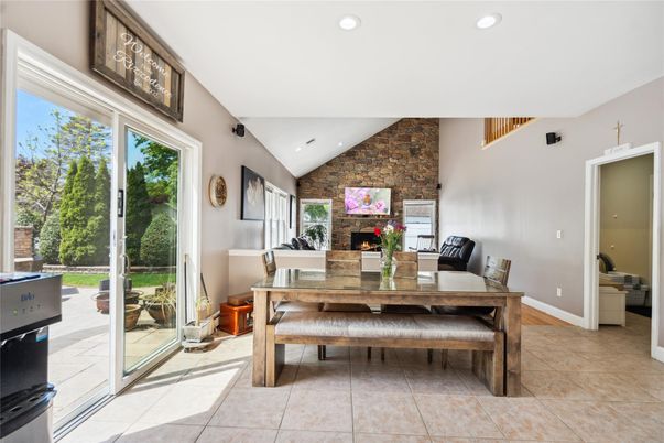 Dining room, Fireplace, Interior, Recessed Lighting, Stone Walls
