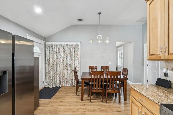 Dining room, Interior, Kitchen, Pendant Lights, Recessed Lighting, Stainless Steel Appliances, Wood Texture Flooring