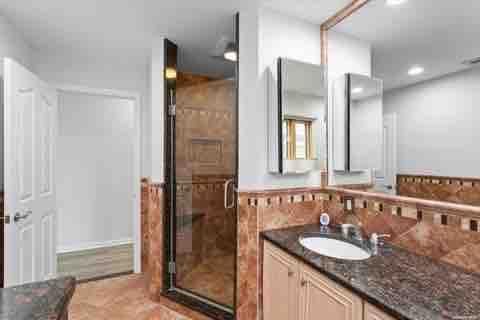 Bathroom, Dual Sink Vanities, Glass Shower, Interior, Recessed Lighting