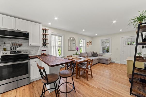 Dining room, Interior, Kitchen, Living room, Recessed Lighting, Stainless Steel Appliances, Wood Texture Flooring