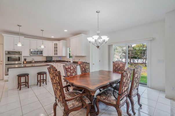 Chandelier, Dining room, Interior, Kitchen, Pendant Lights, Recessed Lighting, Stainless Steel Appliances