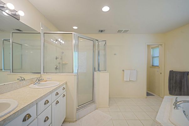 Bathroom, Dual Sink Vanities, Glass Shower, Interior, Recessed Lighting, Tile Countertops