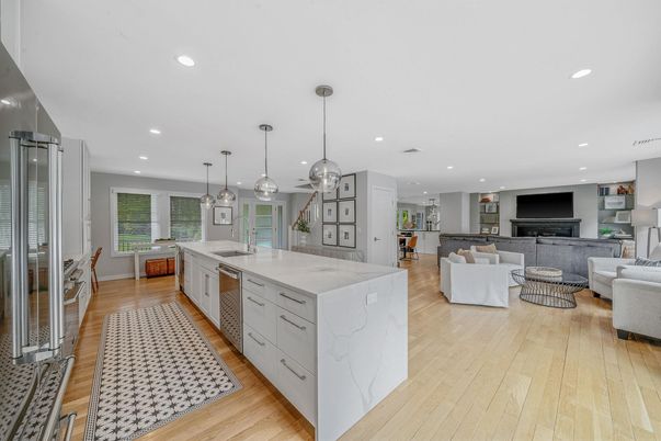 Dining room, Fireplace, Interior, Kitchen, Living room, Pendant Lights, Recessed Lighting, Stainless Steel Appliances, Wood Texture Flooring