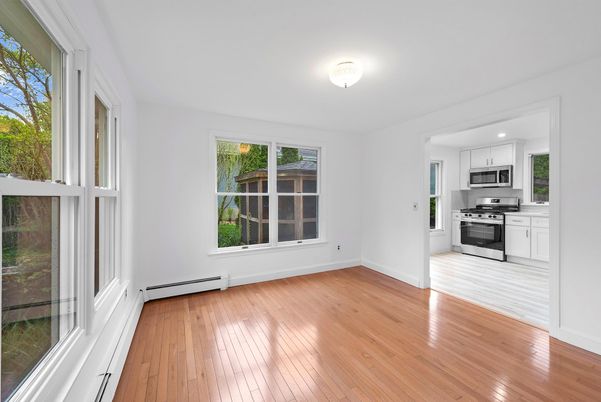Empty room, Interior, Kitchen, Stainless Steel Appliances, Wood Texture Flooring