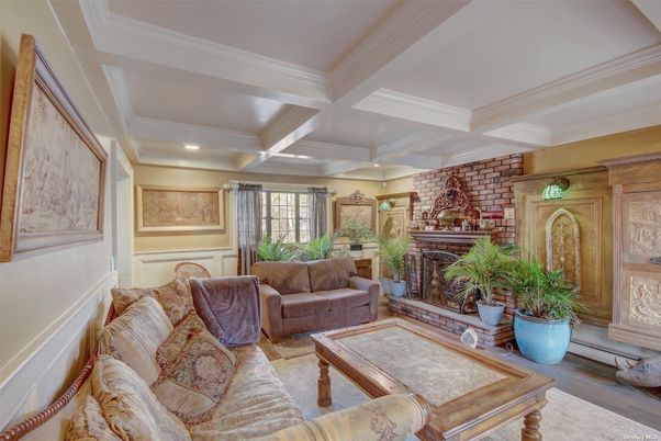 Fireplace, Interior, Living room, Recessed Lighting, Stone Walls, Wood Texture Flooring