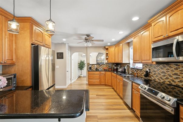 Interior, Kitchen, Pendant Lights, Recessed Lighting, Stainless Steel Appliances, Wood Texture Flooring