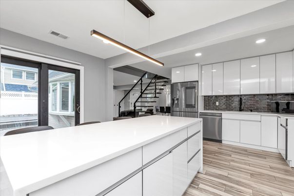Interior, Kitchen, Pendant Lights, Recessed Lighting, Stainless Steel Appliances, Wood Texture Flooring