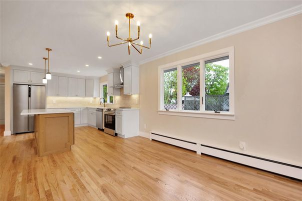 Chandelier, Interior, Kitchen, Pendant Lights, Recessed Lighting, Stainless Steel Appliances, Wood Texture Flooring