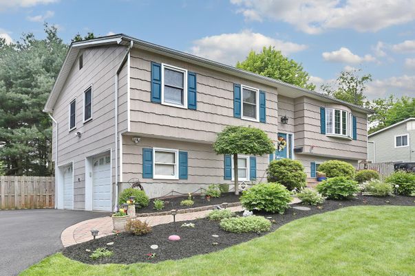 Attached, Exterior, Facade, Raised Ranch