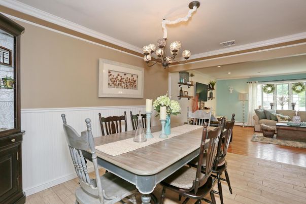 Chandelier, Dining room, Fireplace, Interior, Living room, Recessed Lighting, Wood Texture Flooring