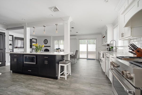 Dining room, Interior, Kitchen, Pendant Lights, Recessed Lighting, Stainless Steel Appliances, Wood Texture Flooring