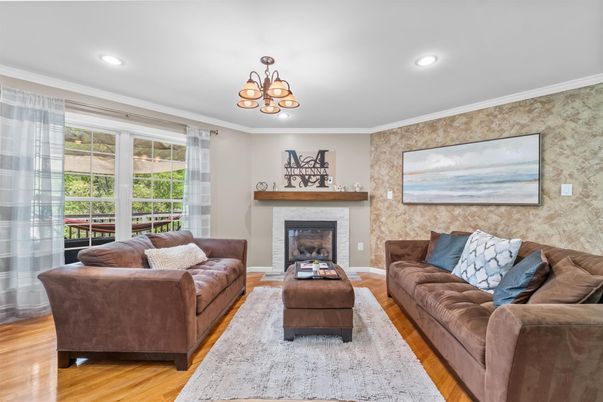 Chandelier, Fireplace, Interior, Living room, Recessed Lighting, Wood Texture Flooring