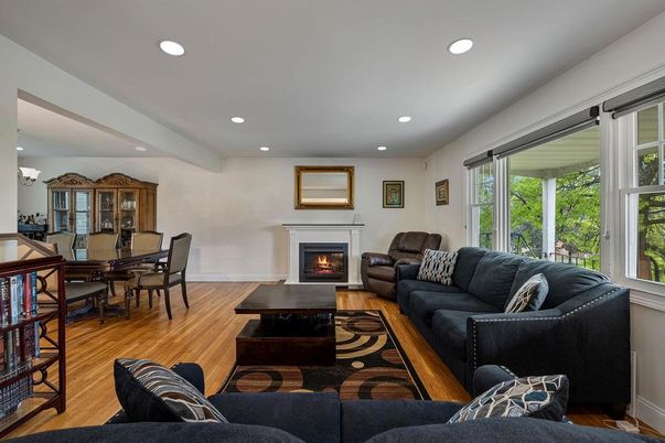 Dining room, Fireplace, Interior, Living room, Recessed Lighting, Wood Texture Flooring