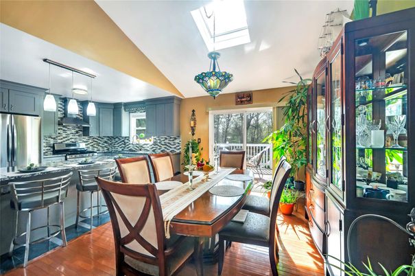 Dining room, Interior, Kitchen, Pendant Lights, Stainless Steel Appliances, Wood Texture Flooring