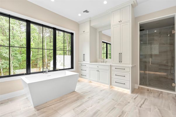 Bathroom, Dual Sink Vanities, Free Standing Baths, Glass Shower, Interior, Recessed Lighting, Wood Texture Flooring