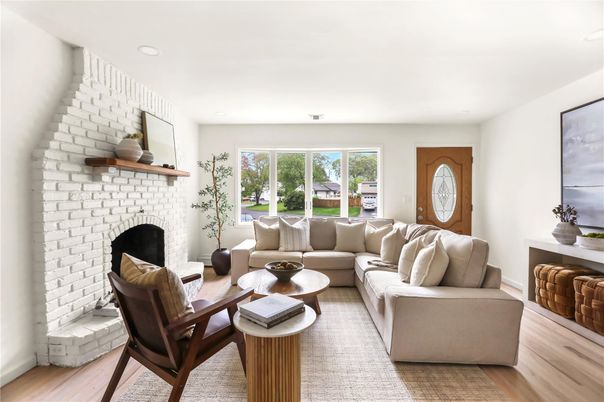 Fireplace, Interior, Living room, Recessed Lighting, Stone Walls, Wood Texture Flooring