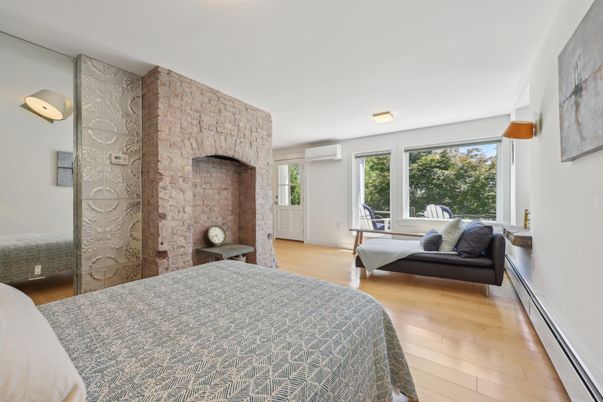 Bedroom, Fireplace, Interior, Stone Walls, Wood Texture Flooring