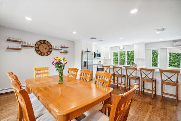 Dining room, Interior, Kitchen, Recessed Lighting, Stainless Steel Appliances, Wood Texture Flooring