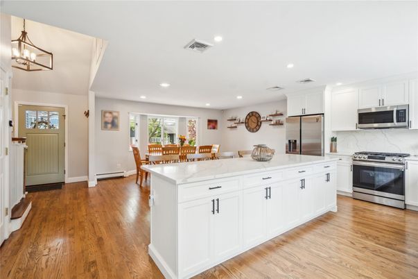 Dining room, Interior, Kitchen, Recessed Lighting, Stainless Steel Appliances, Wood Texture Flooring