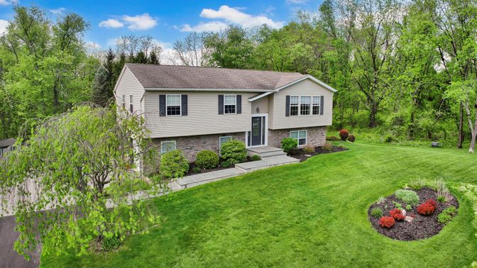 Backyard, Exterior, Facade, Brick Facade, Raised Ranch