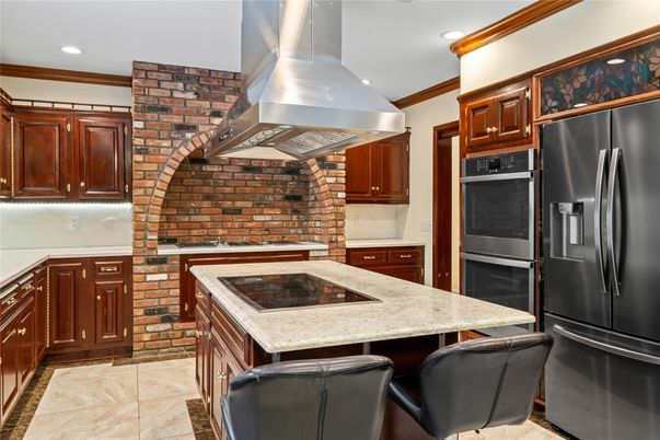 Interior, Kitchen, Recessed Lighting, Stainless Steel Appliances, Stone Walls