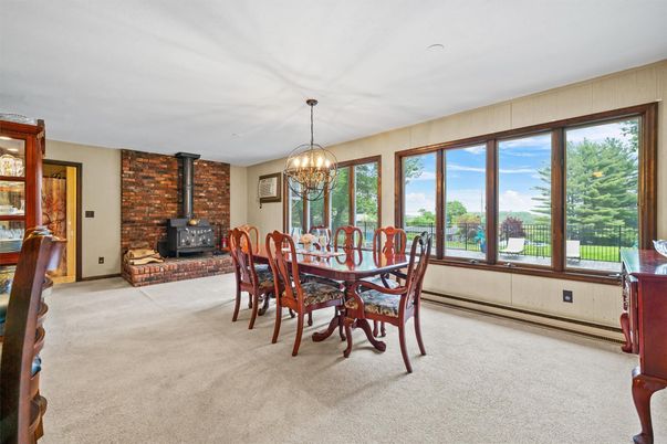 Chandelier, Dining room, Fireplace, Interior, Stone Walls