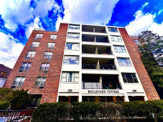 Exterior, Facade, Brick Facade, Condo Building