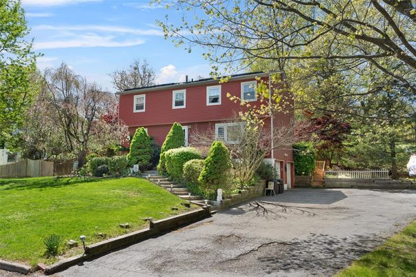 Backyard, Exterior, Facade, Brick Facade, Raised Ranch