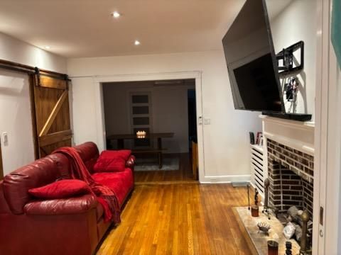 Fireplace, Interior, Living room, Recessed Lighting, Wood Texture Flooring