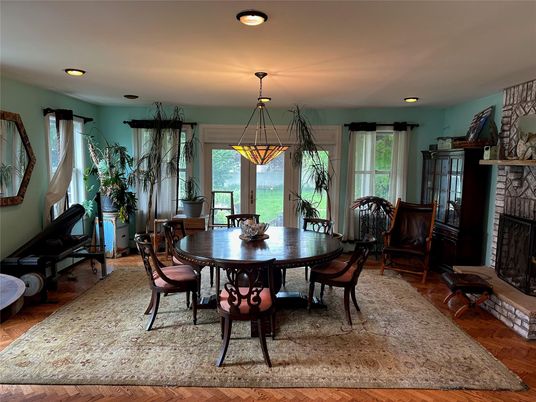 Dining room, Fireplace, Interior, Pendant Lights, Recessed Lighting, Wood Texture Flooring
