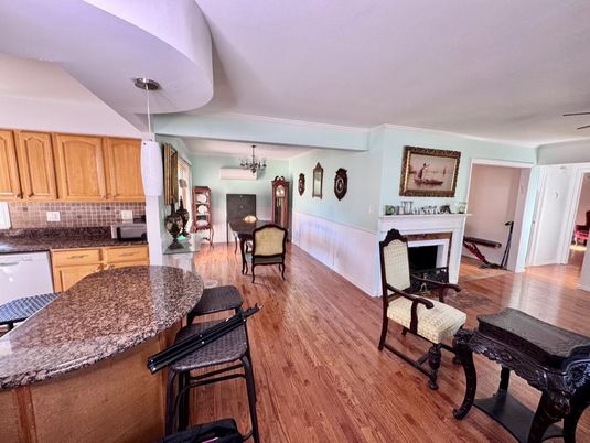 Chandelier, Dining room, Fireplace, Interior, Kitchen, Living room, Pendant Lights, Wood Texture Flooring