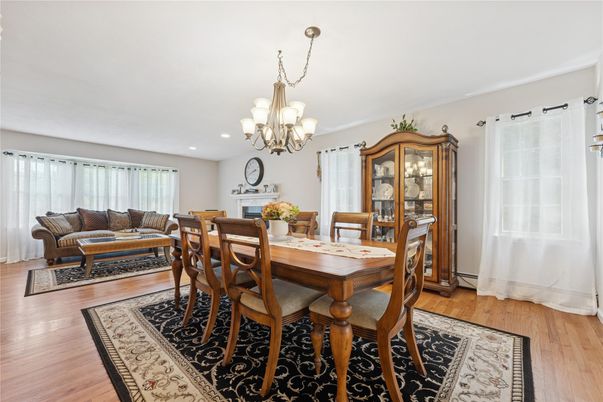 Chandelier, Dining room, Fireplace, Interior, Living room, Recessed Lighting, Wood Texture Flooring