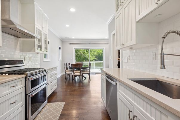 Dining room, Interior, Kitchen, Recessed Lighting, Stainless Steel Appliances, Wood Texture Flooring