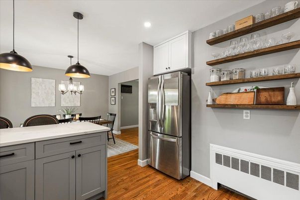 Dining room, Interior, Kitchen, Pendant Lights, Recessed Lighting, Stainless Steel Appliances, Wood Texture Flooring
