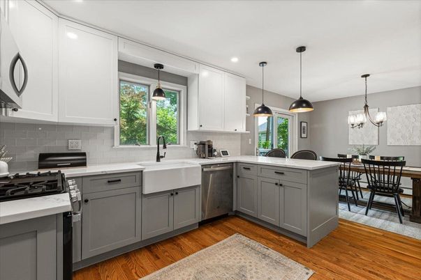 Dining room, Interior, Kitchen, Pendant Lights, Recessed Lighting, Stainless Steel Appliances, Wood Texture Flooring