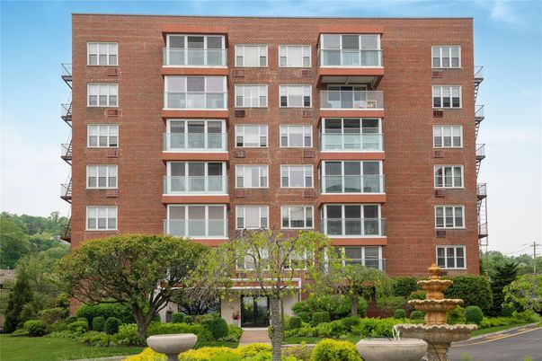 Exterior, Facade, Brick Facade, Condo Building