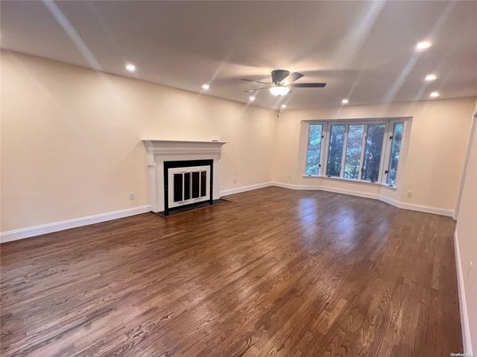 Empty room, Fireplace, Interior, Recessed Lighting, Wood Texture Flooring