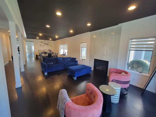 Dining room, Fireplace, Interior, Living room, Recessed Lighting, Wood Texture Flooring