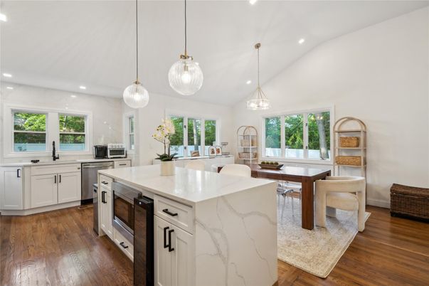 Dining room, Interior, Kitchen, Pendant Lights, Recessed Lighting, Stainless Steel Appliances, Wood Texture Flooring