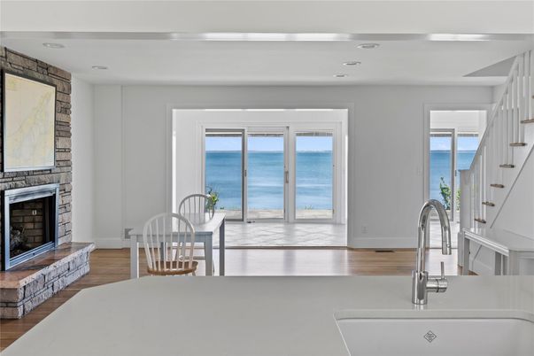Fireplace, Interior, Kitchen, Recessed Lighting, Water, Wood Texture Flooring