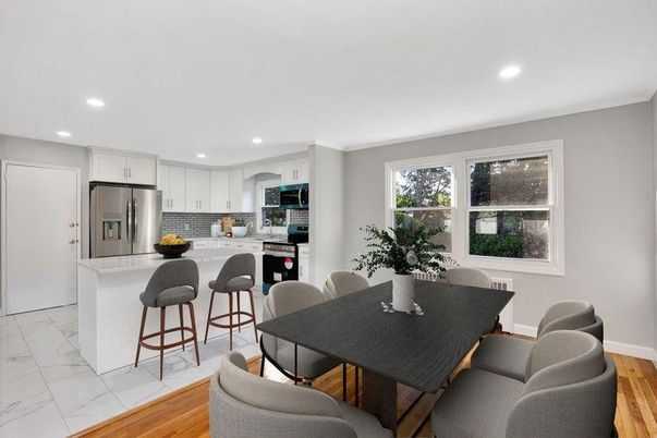 Dining room, Interior, Kitchen, Marble, Recessed Lighting, Stainless Steel Appliances, Wood Texture Flooring