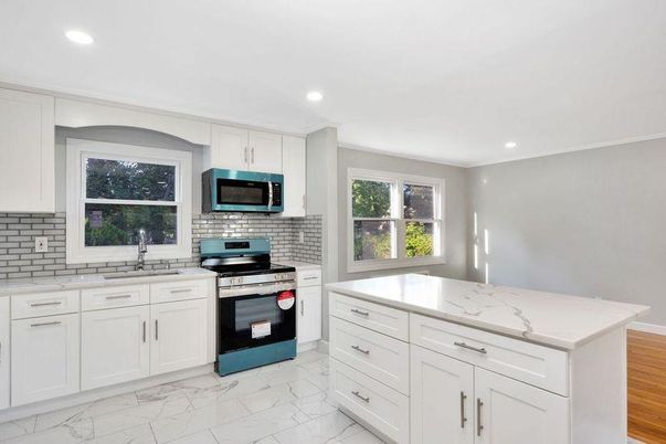Interior, Kitchen, Marble, Recessed Lighting, Stainless Steel Appliances, Wood Texture Flooring