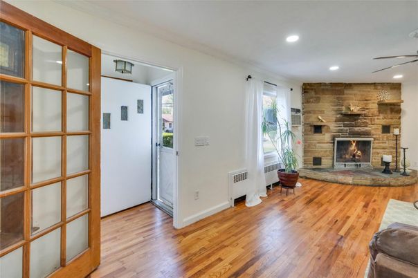 Fireplace, Interior, Recessed Lighting, Stone Walls, Wood Texture Flooring