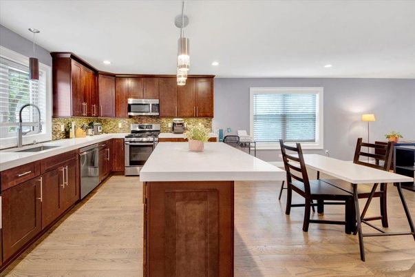 Dining room, Interior, Kitchen, Pendant Lights, Recessed Lighting, Stainless Steel Appliances, Wood Texture Flooring
