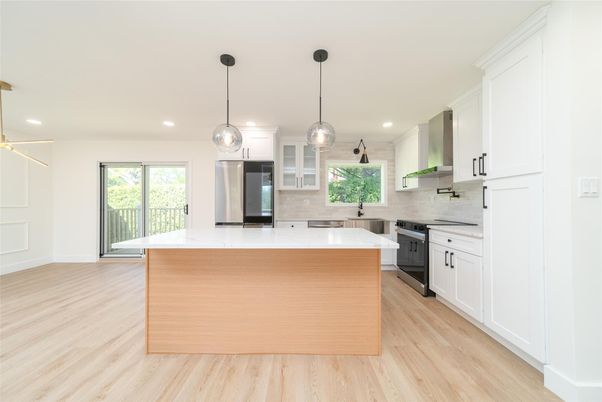Interior, Kitchen, Pendant Lights, Recessed Lighting, Stainless Steel Appliances, Wood Texture Flooring