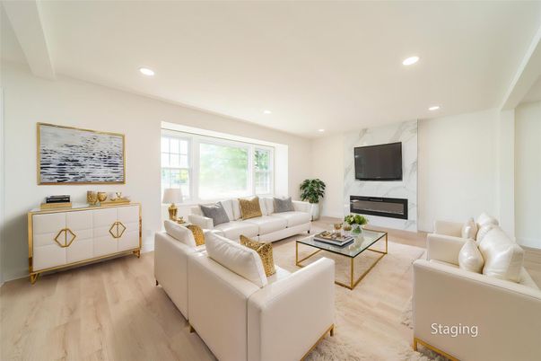 Fireplace, Interior, Living room, Marble Walls, Recessed Lighting, Wood Texture Flooring