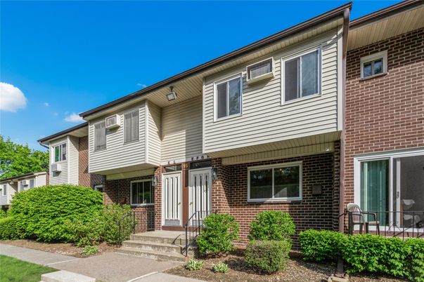 Exterior, Facade, Brick Facade, Raised Ranch