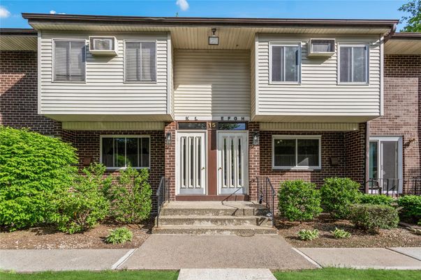 Exterior, Facade, Brick Facade, Raised Ranch