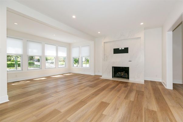 Empty room, Fireplace, Interior, Marble Walls, Recessed Lighting, Wood Texture Flooring