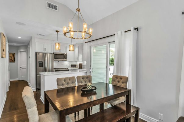 Chandelier, Dining room, Interior, Kitchen, Pendant Lights, Recessed Lighting, Stainless Steel Appliances, Wood Texture Flooring